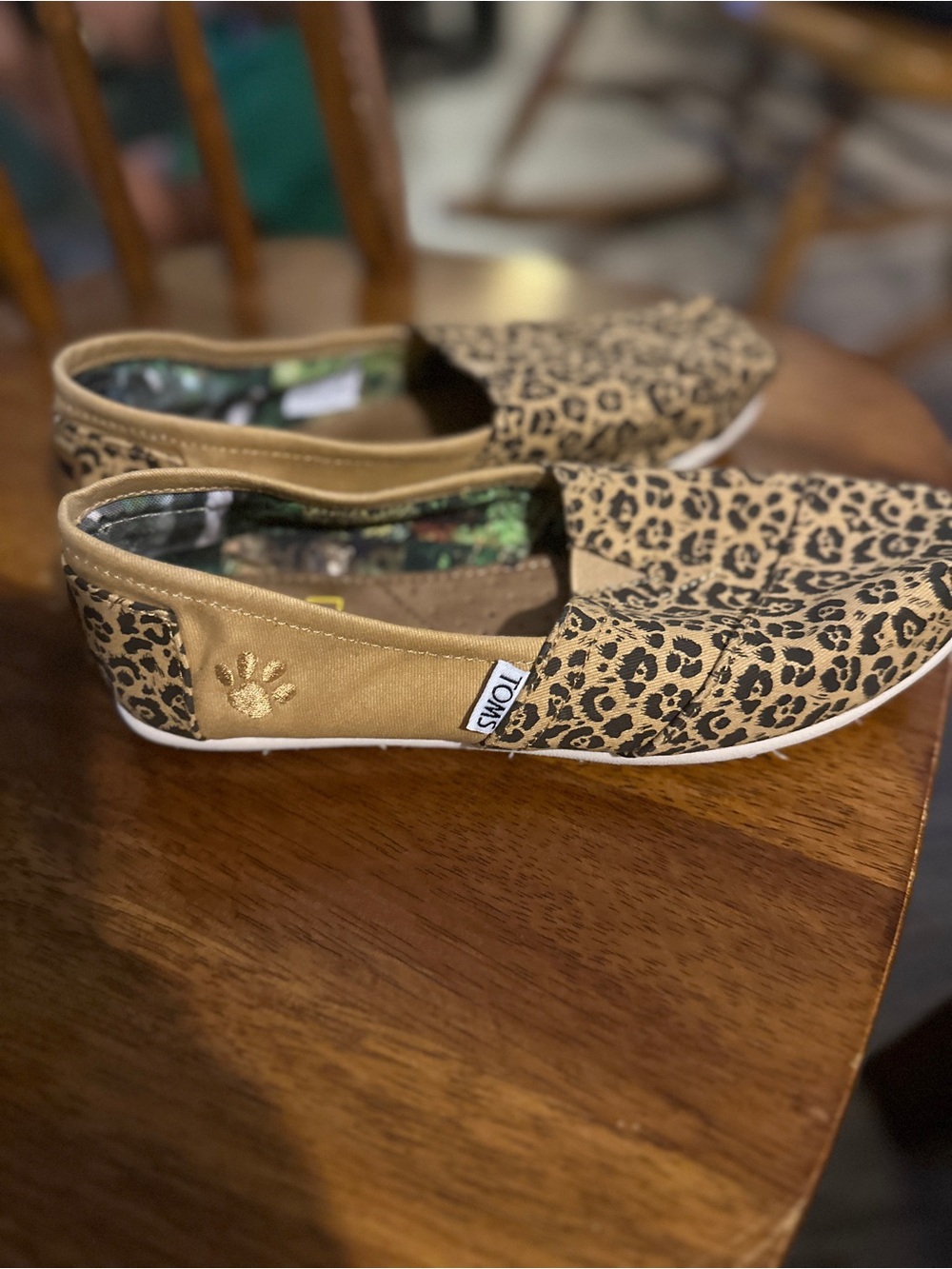 Toms Women's Leopard Print Slip-On Flats in Tan and Black
